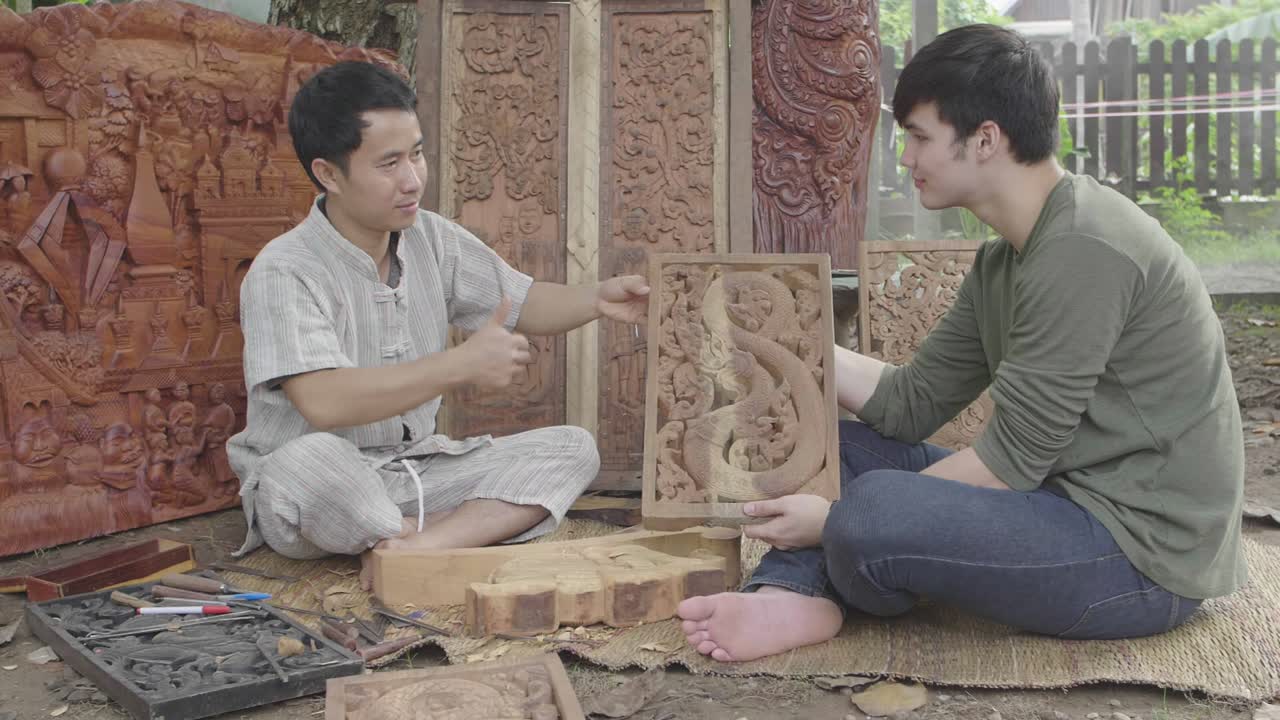 Teacher Thumb Up To His Student After Finished Carving Wood, Slow Motion