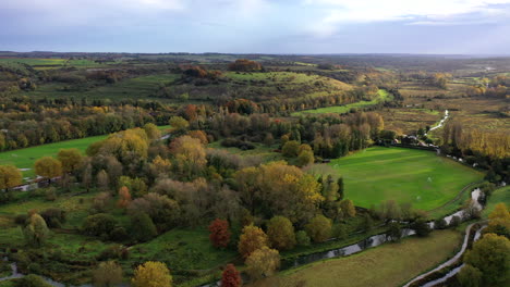aerial flying towards st catherine's hill winchester day countryside autumn uk