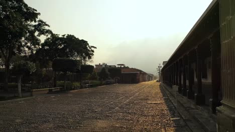 Aerial-view-of-Antigua-Guatemala’s-usually-bustling-Central-Park,-eerily-empty-due-to-COVID-19-restrictions