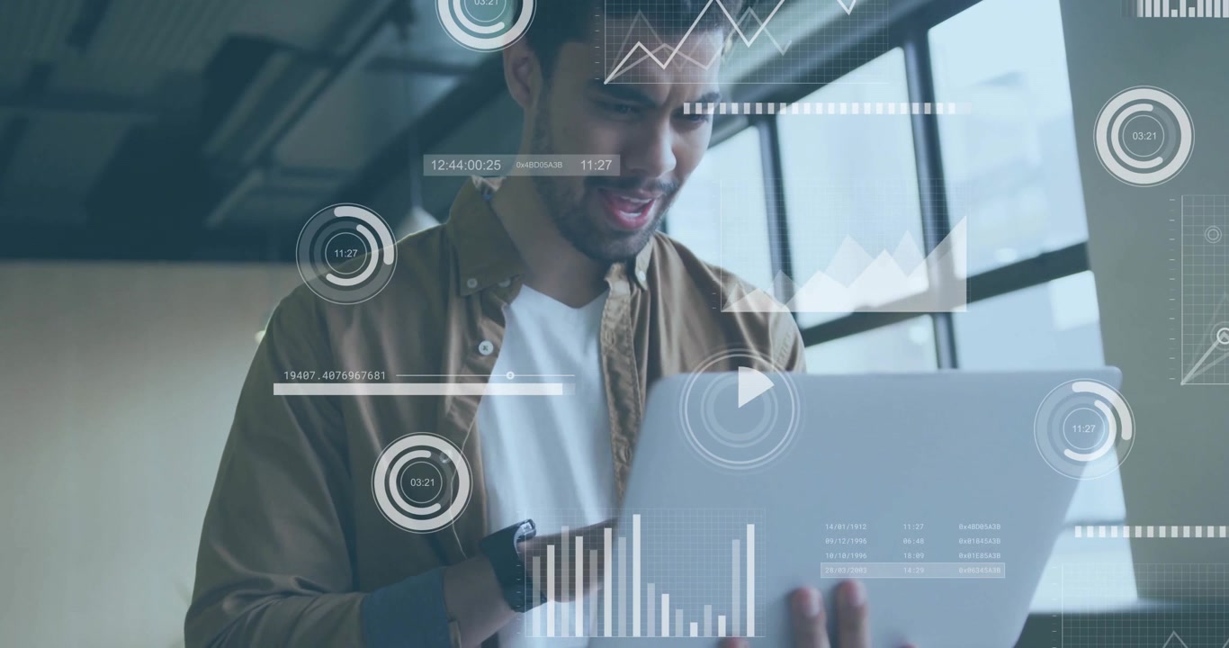 Data analyst starting typing on laptop beside window revealing animated charts for data analysis
