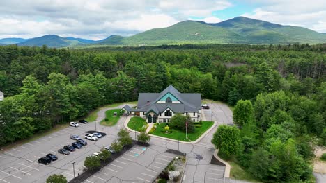 aerial view of a catholic church in the white mountains in new hampshire in summer