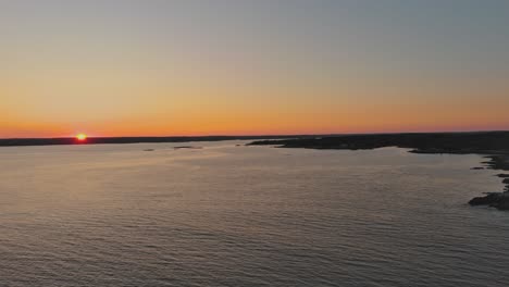 sunset aerial view of coastal sea near southport, maine