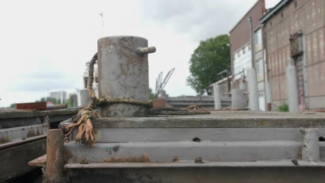 Arc-shot-of-an-old-rusty-bollard