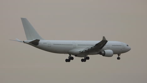 inbound airplane experiencing heavy turbulence during landing, taking the plane nearly out of course