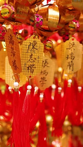 hanging golden bells with red tassels in hong kong