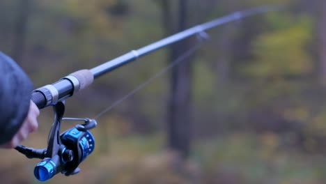 fishing rod in hand