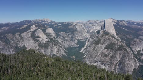 super wide aerial shot of yosemite valley with half dome from glacier point