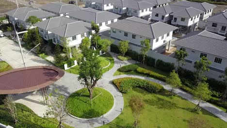 aerial footage of white and gray modern comtemporary house