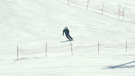 guy skiing making parallel turn on downhill of ski resort in okuhida hirayu, gifu, japan