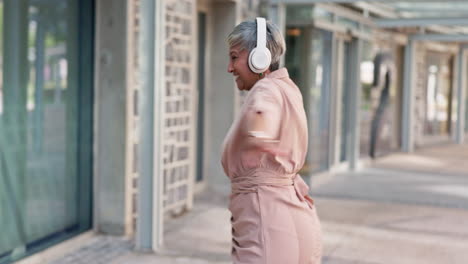 happy woman headphones or senior dancing in city