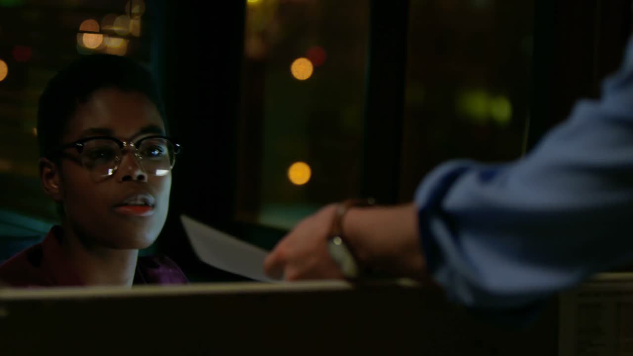 Female executive working on computer at desk 4k