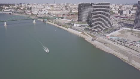 Fantastic-non-graded-aerial-establishing-shot-of-Sava-river-Old-train-bridge-and-Belgrade-Waterfront