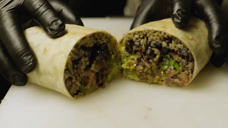 ched cuts burrito in half and shows it