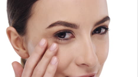 Beauty-portrait-of-woman-touching-beautiful-face-in-slow-motion-skincare-concept-on-a-white-background