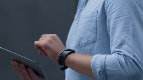 male hands holding digital tablet computer close up. manager working online.