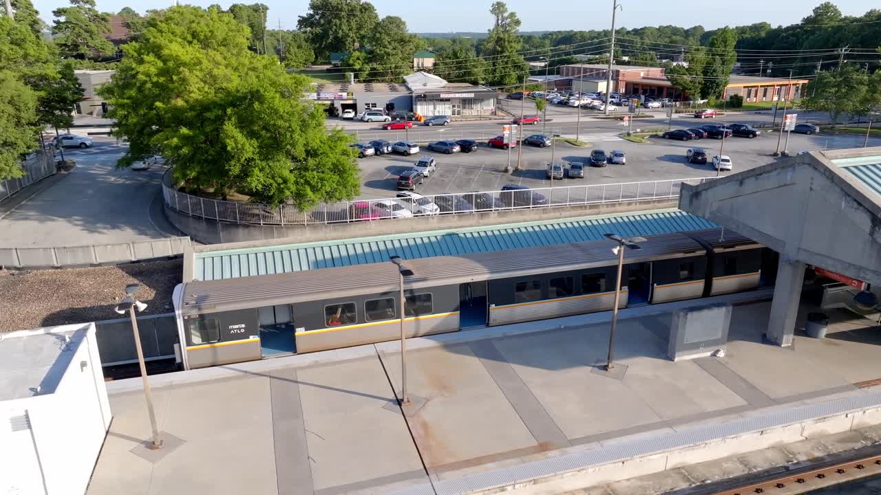Marta train standing at Doraville subway station, New Peachtree road, Atlanta, Georgia, Drone shot