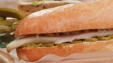 herring sandwich with pickles