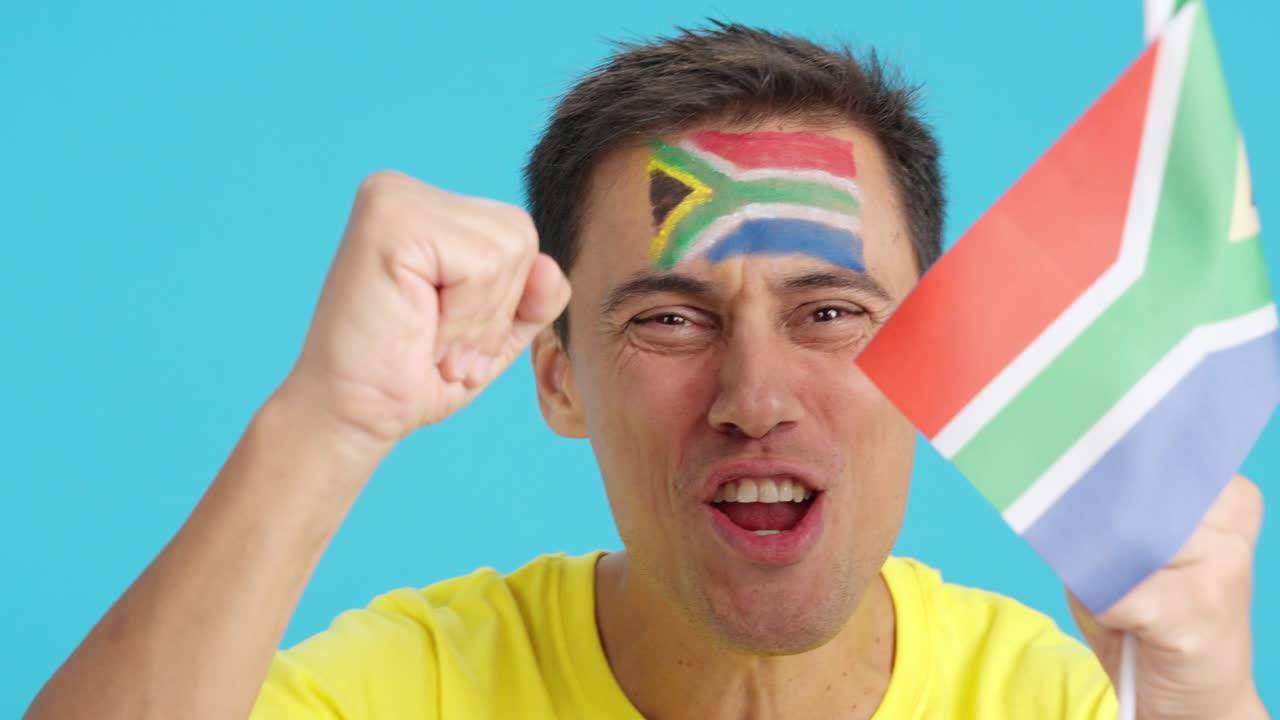 Close up of a man supporting south african team