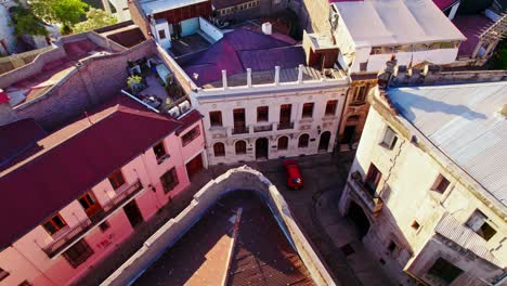 Top-down-view-of-Charming-Concha-y-Toro-neighborhood-Center-in-Santiago-Chile,-Orbiting-shot