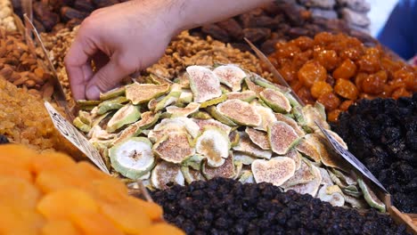 dried fruits and nuts display at a market