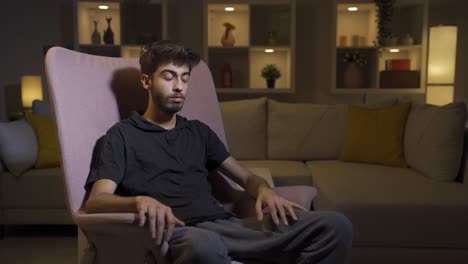 sad man crying at home.
