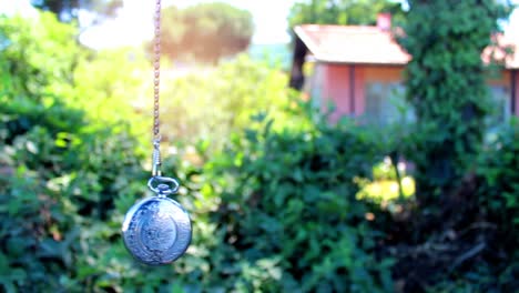 rotating antique classic pocket watch spinning hypnosis