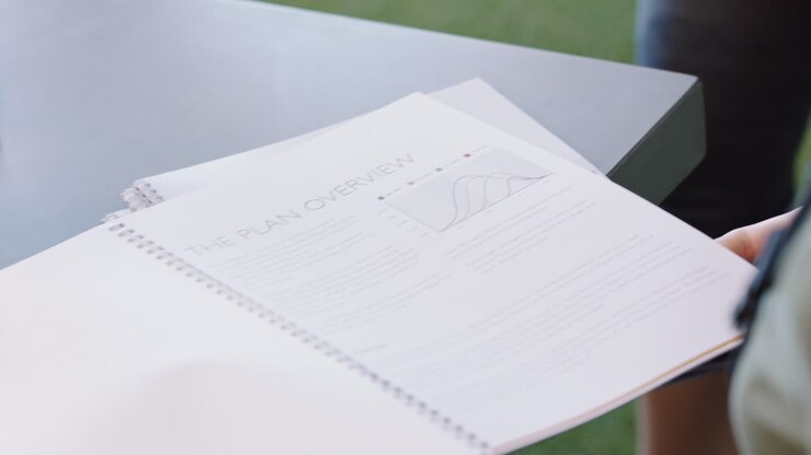 Employee with business strategy document