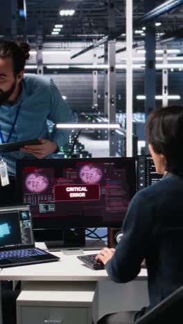 vertical video system administrators in data center struggle with computer bugs while using ai