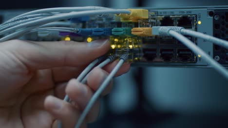network technician installing fiber optic cables