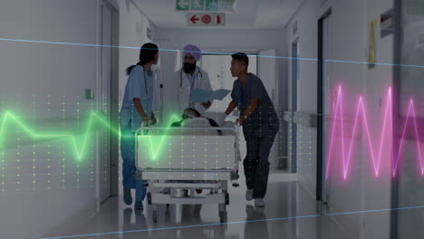 animation of heart rate monitor over team of diverse doctors rushing a patient in operation theatre
