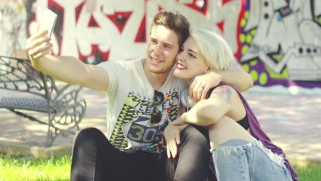 loving trendy young couple taking a selfie