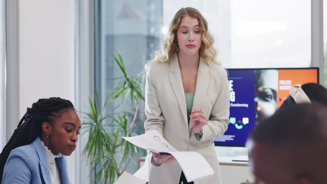 Business meeting with a woman presenting a project