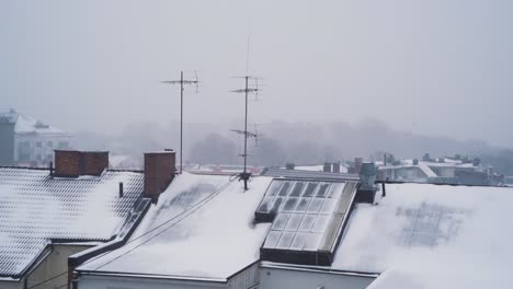 snow covered rooftops in sankt hanshaugen, oslo