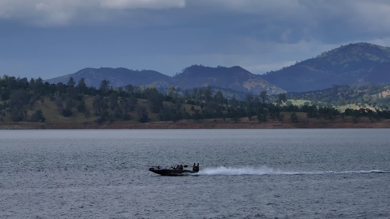 Bass boat driving on a lake