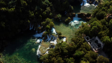 Bird's-Eye-View-Of-Waterfalls-In-Krka-National-Park-During-Summer---aerial-drone-shot