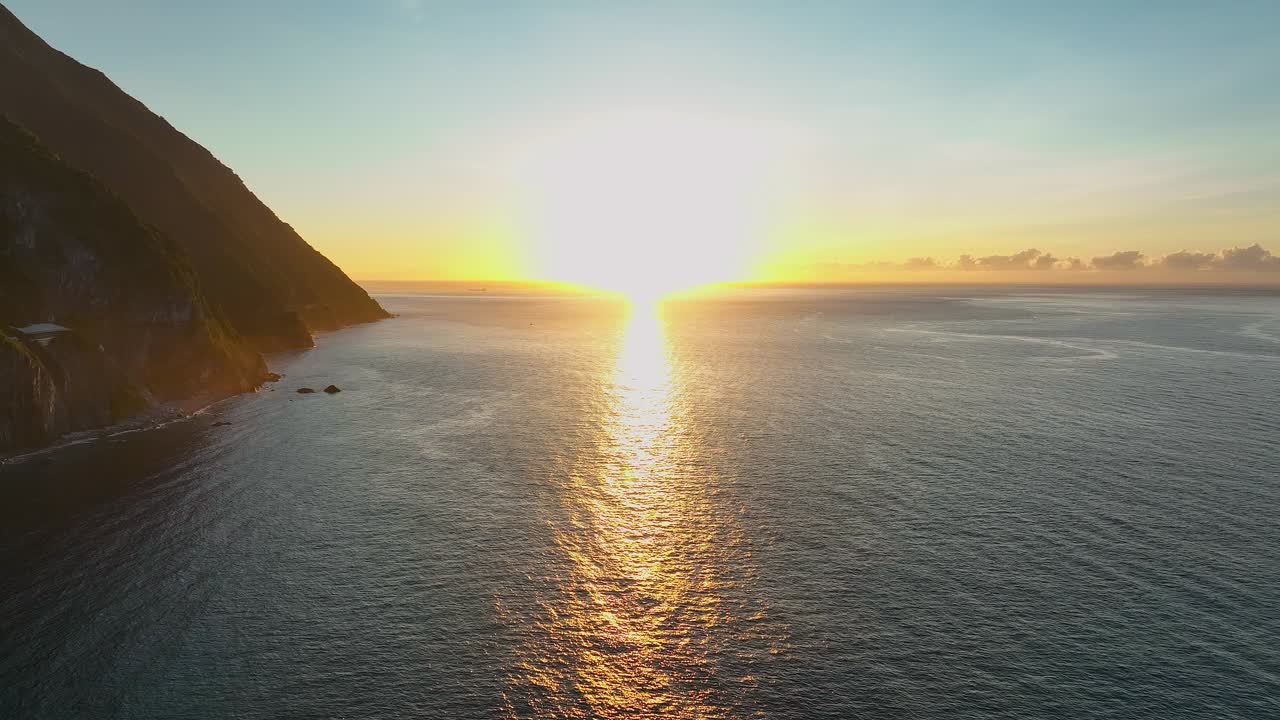 Aerial view of beautiful sunset in Taiwan near Nationalpark with reflection on sea