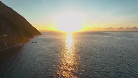 aerial view of beautiful sunset in taiwan near nationalpark with reflection on sea
