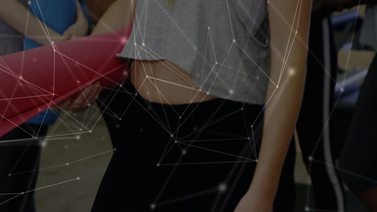 Braided woman centering as camera pulling back, animated overlay over group, blue mats, for fitness