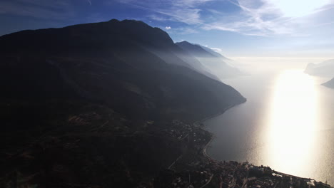 aerial view of majestic mountain-encircled lake, italy