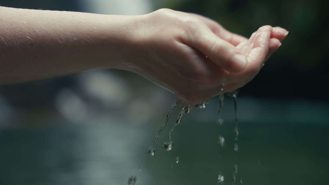 Close-up of hand in water