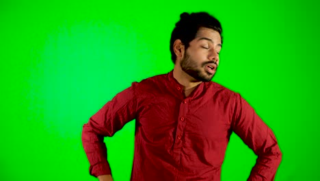 Indian-guy-have-muscle-pain-on-green-screen---green-table