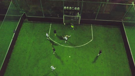 indoor soccer game at night