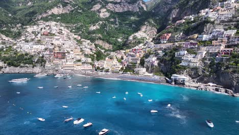 amalfi coast at positano in salerno italy. coastal city. waterfront landscape. amalfi coast at positano in salerno italy. beach scenery. medieval buildings. amalfi coast skyline