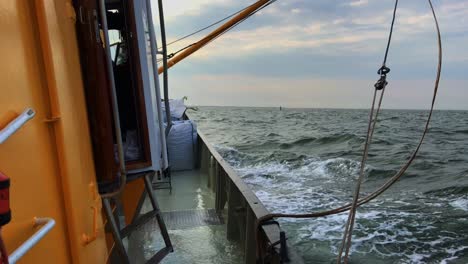 a shrimp cutter at sea. the ship is sailing the north sea.