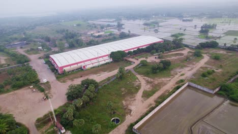 view from above of a contemporary factory in a rural area of south india