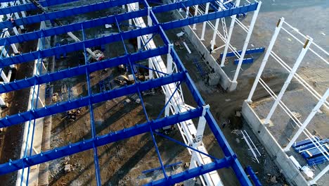 plant construction, construction of a large factory, industrial exterior, construction site, aerial view, metal and concrete structures, construction machinery