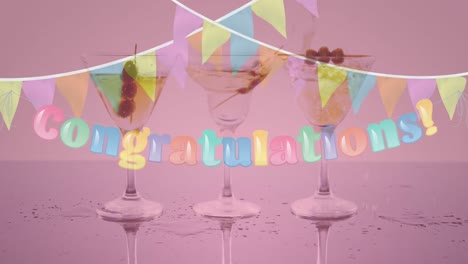 Animation-of-congratulation-text-and-bunting-over-three-cocktail-glasses-on-pink-background