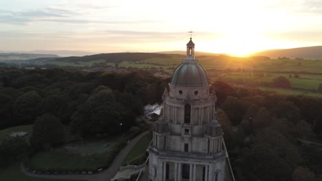 historic ashton memorial english grand dome landmark lancashire countryside sunrise aerial left orbit view