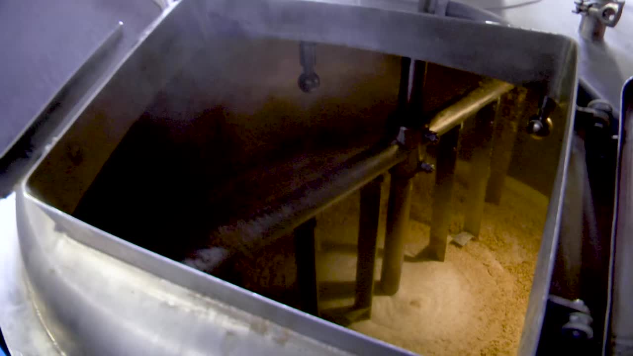 Close-up view of a mash tun during the beer brewing process