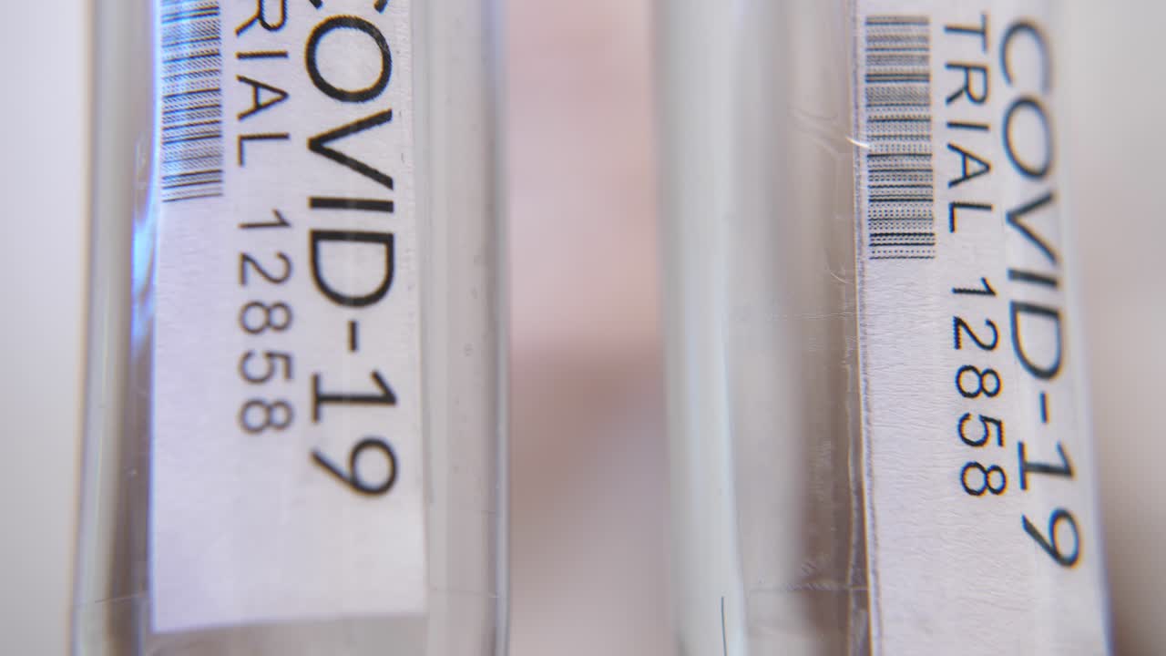 Close-up of COVID-19 Trial Test Tubes in a Laboratory Setting